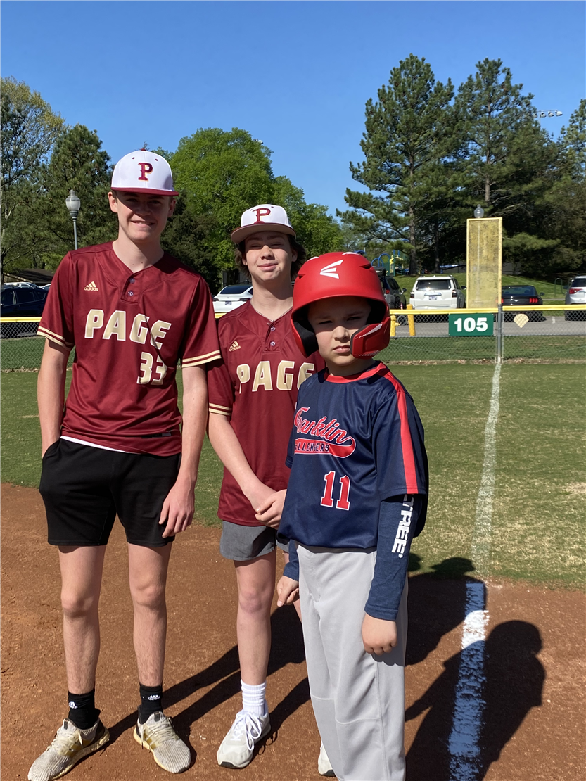 Students playing baseball